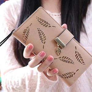 Never used beige and gold wallet